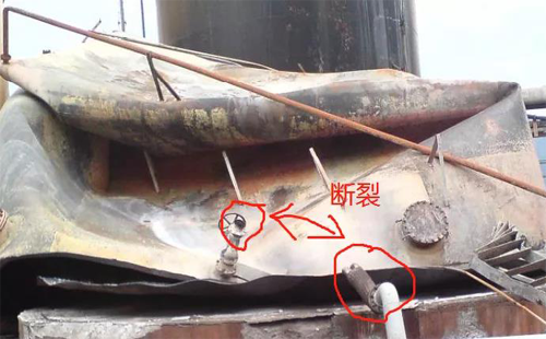儲罐火災中燒斷的金屬軟管 儲罐火災中燒斷的金屬軟管